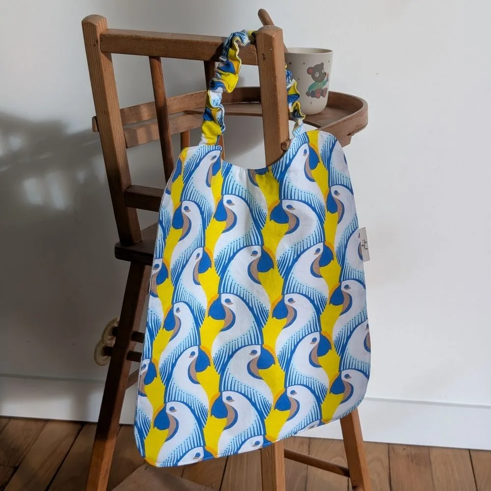 serviette élastiquée perroquets